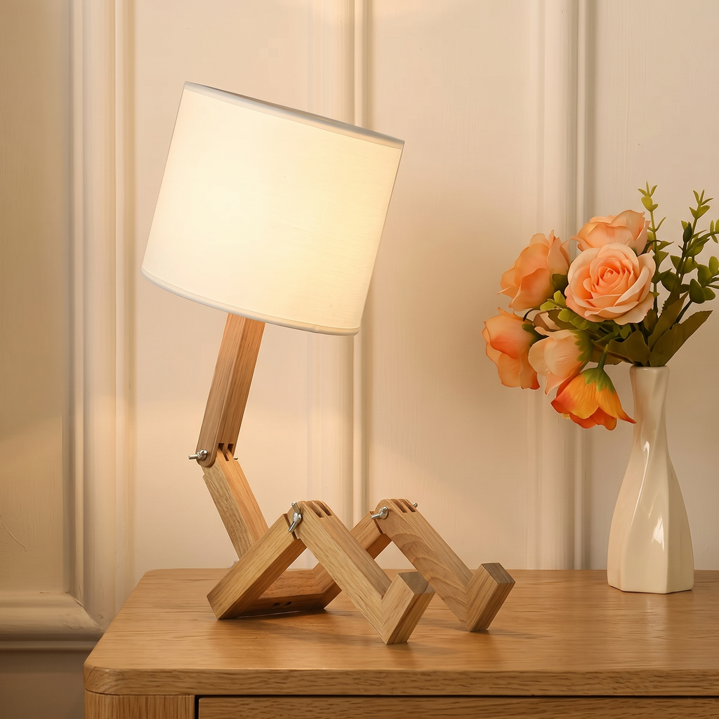 Rilna lamp lit on an oak side table