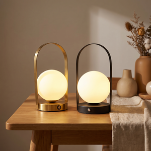 Cindor lamp lit on an oak dining table