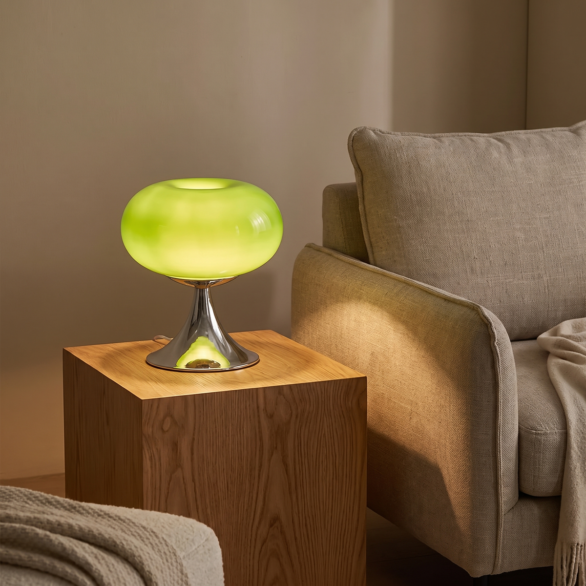 Louna lamp lit on an oak side table